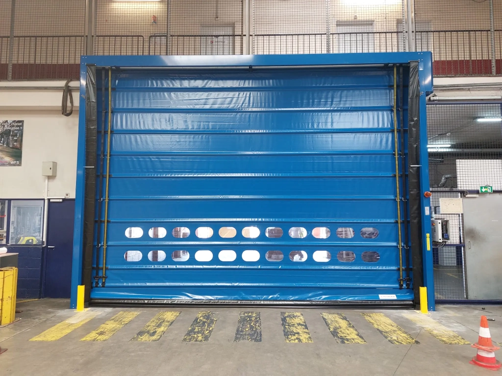 Remplacement d’une porte souple automatique sur un site aéronautique  à Toulouse.