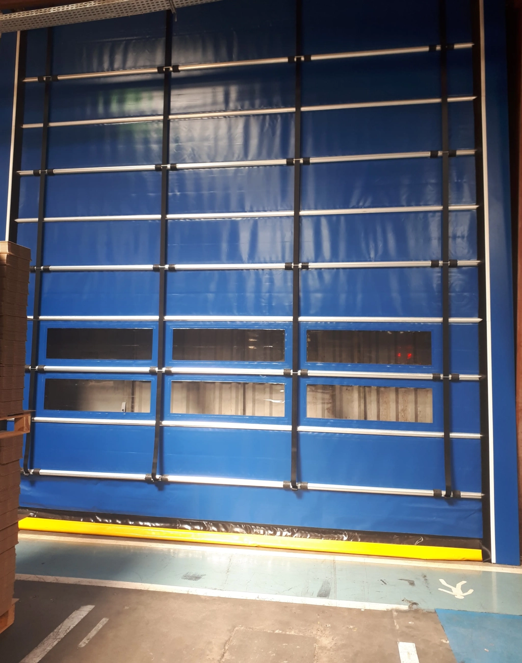 Installation d'une porte souple à empilement automatique à Toulouse